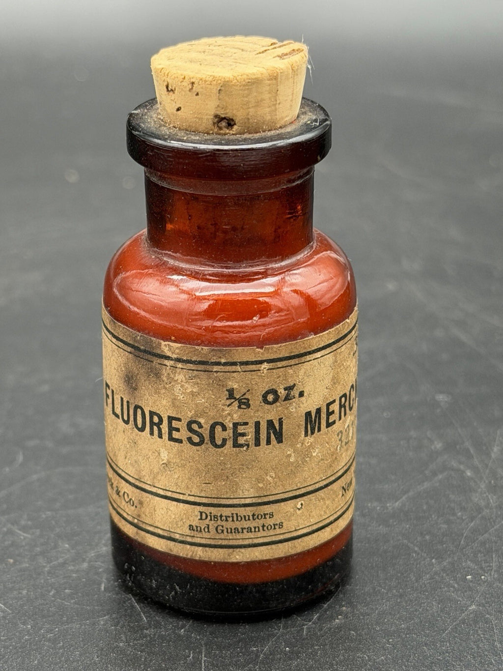 Antique Merck & Co. Fluorescein 1/8 Oz Amber Glass Apothecary Bottle w/ Cork
