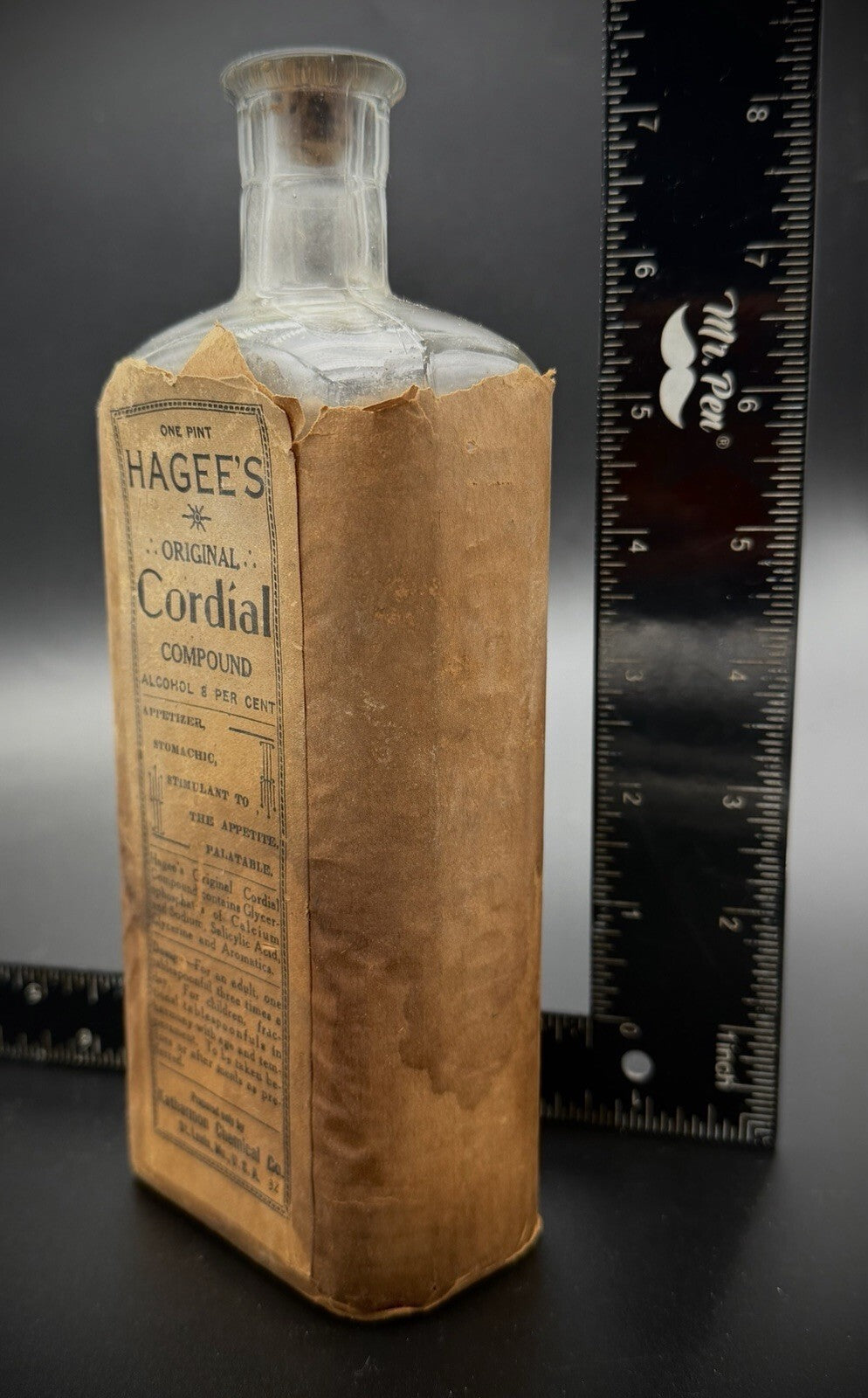 Antique Hagee's Original Cordial Medicine Bottle Paper Wrapper Katharmon Co.