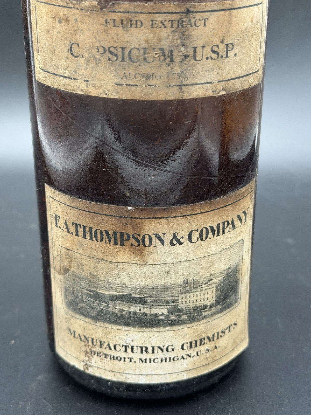 Antique F.A. Thompson Capsicum Amber Glass Apothecary Bottle Detroit Label